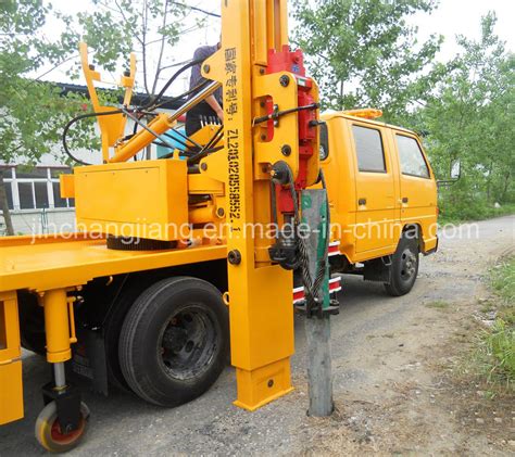 truck mounted guardrail post driver